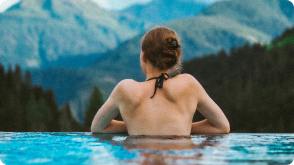 Woman in a pool in the Alps