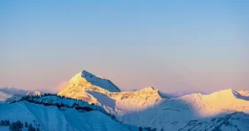 Dusk over the snowy mountains in the Alps