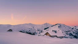 A beautiful sunset over snowy mountains