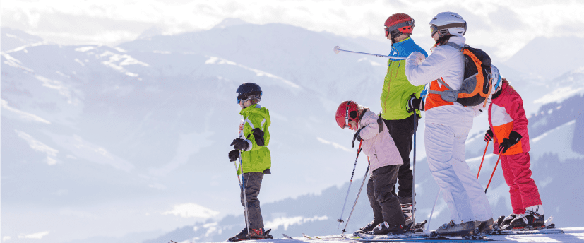 Family skiing on a mountain